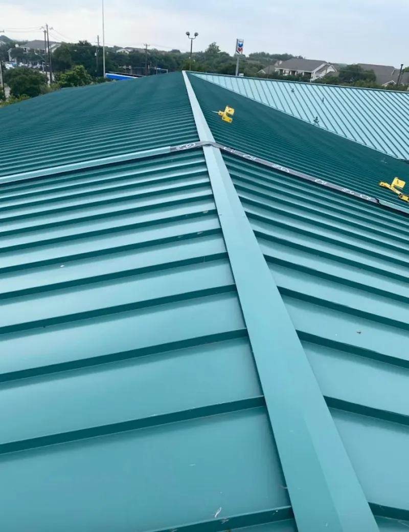Green commercial metal roof ridge and valley for Metal Roof Repair in Salina